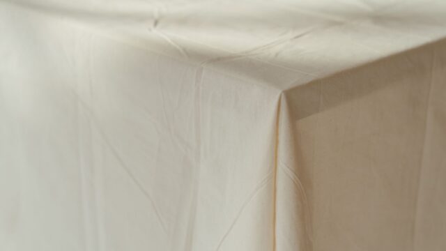 folded linen tablecloth